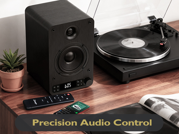 Text reads 'Precision Audio Control'. Multiple views of a turntable or record player system with various control interfaces and components.