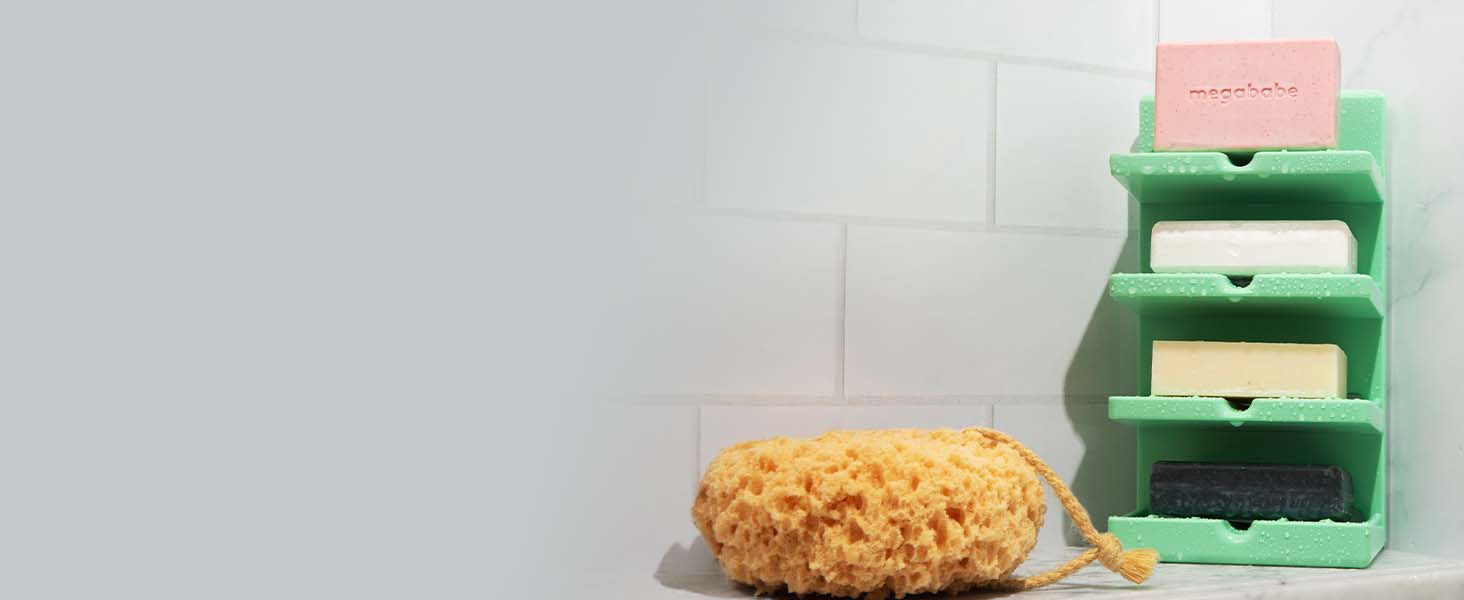 Bar soap tower next to sponge.