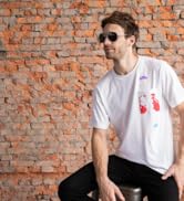 3.1 J+S Vision Rangi Sunglasses - man wearing classic aviator military style in red brick background