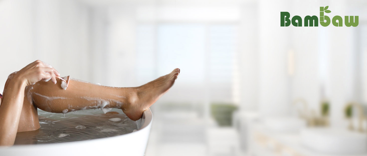 woman's feet in a bathtub with soapy water
