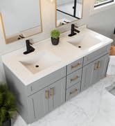 Large gray bathroom vanity with modern white vanity top and gold framed mirrors