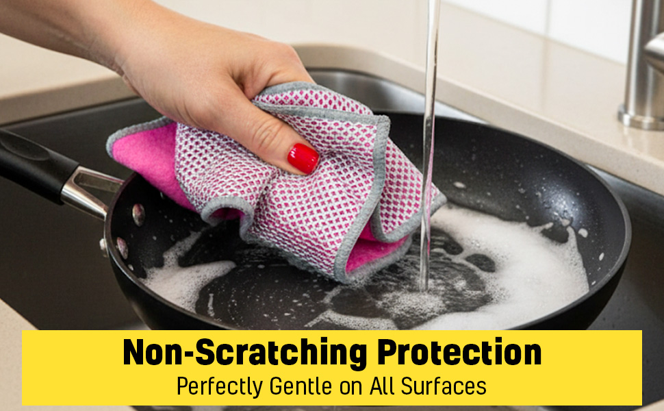 Non-scratch dishwashing rag cleaning frying pan under running water.