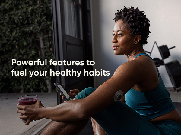 Stelo by Dexcom. Powerful features to fuel your healthy habits. Woman with smoothie after yoga.