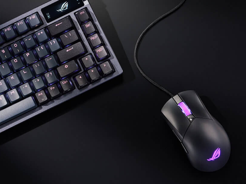Top view of ROG gladius iii core mouse with an azoth keyboard on the side