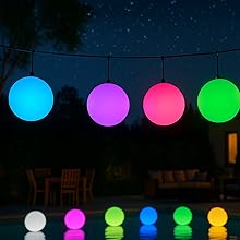 Colorful inflatable LED balls hanging from a wire above a patio
