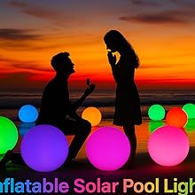A sunset beach proposal surrounded by glowing solar LED balls