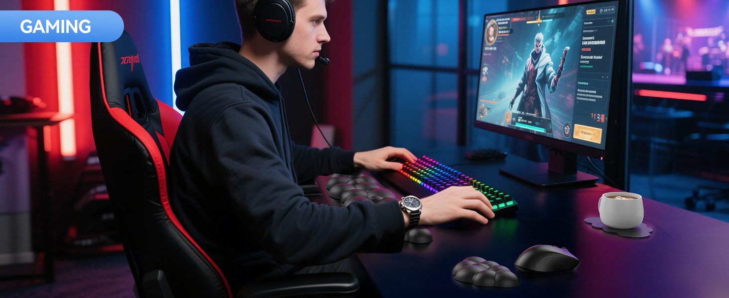 Gamer in hoodie at desk with gaming PC setup, including RGB keyboard, mouse, and monitor displaying a game character. Red and blue ambient lighting visible.