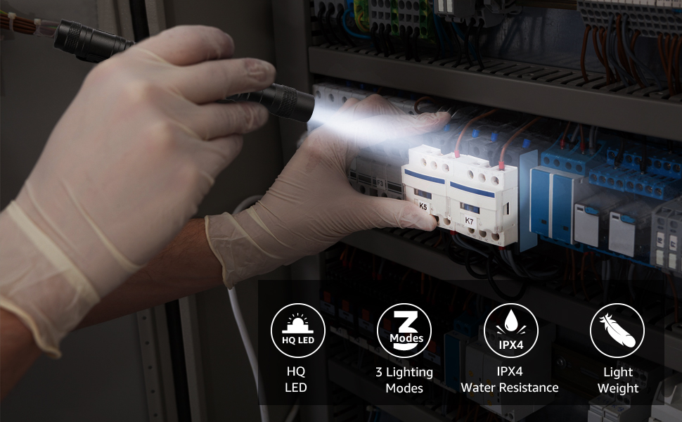 a person is installing a light switch on a circuit board.
