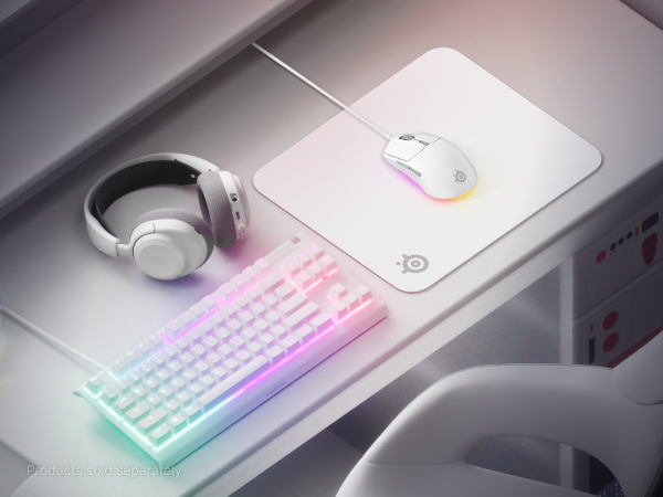 Desktop setup with a keyboard, mouse, headset, and mouse pad