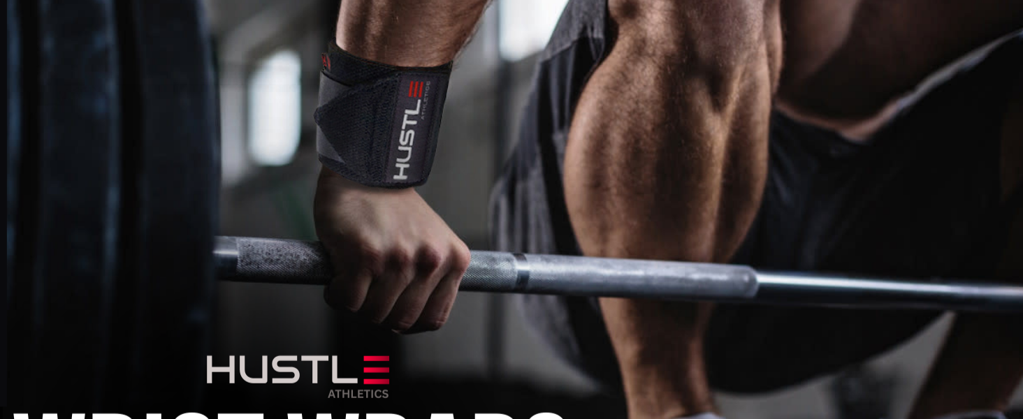 Wrist wraps worn during heavy barbell training for stable wrist support in weightlifting