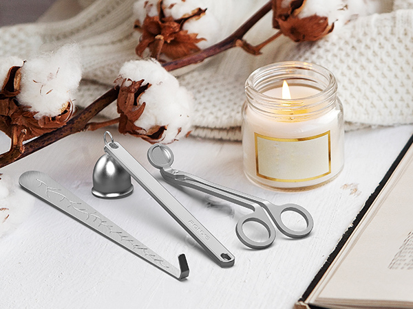 Use a candle snuffer to extinguish the flame gently.