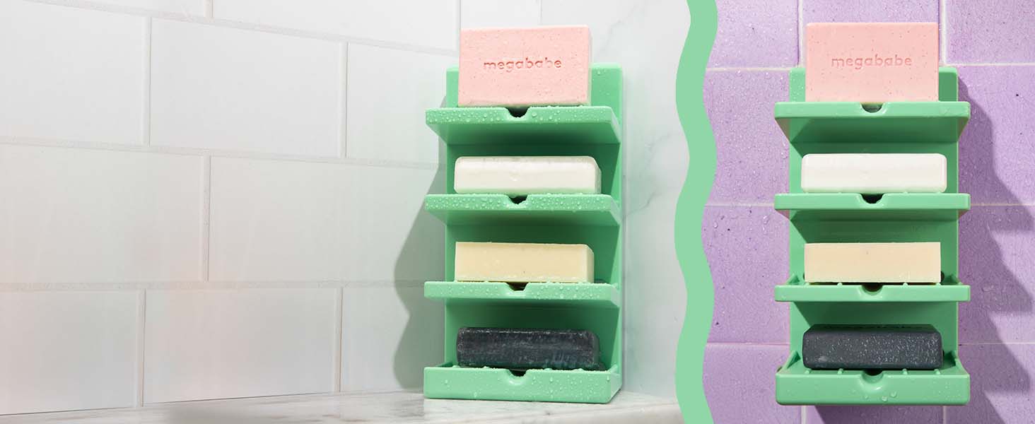 Bar soap tower stuck on wall and sitting on shower shelf.