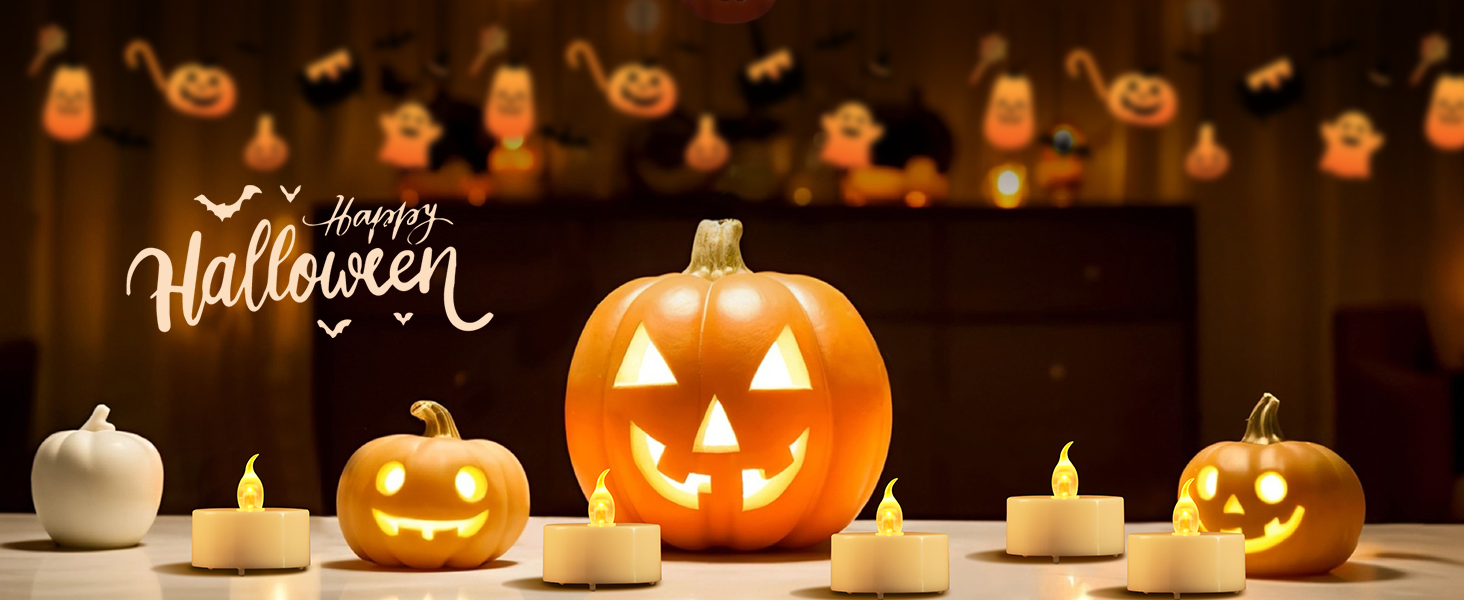 Halloween scene with carved pumpkins and candles. Three jack-o'-lanterns with varying expressions, flanked by white pumpkins and lit tea lights. 'Happy Halloween' text and festive garland visible.