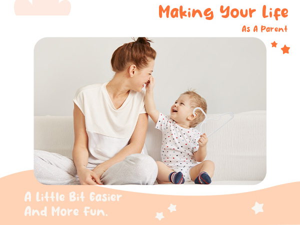 White plastic baby hangers