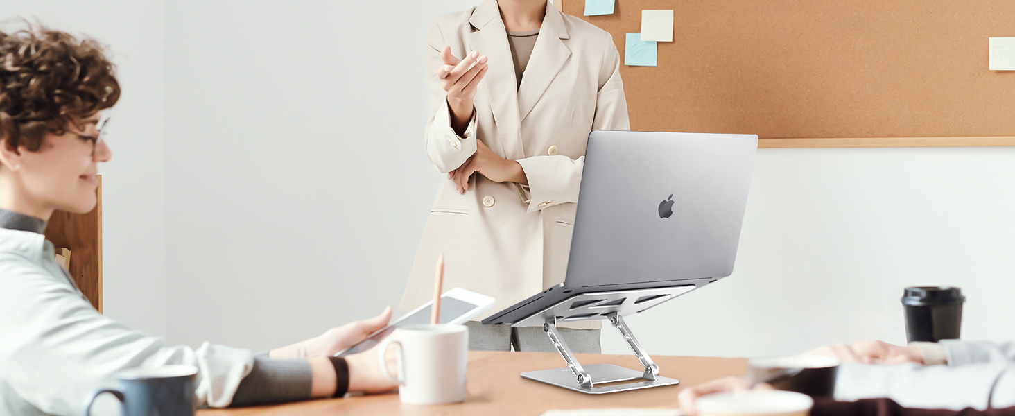 Computer stand for laptop provides stable viewing angles for meetings and workplace collaboration