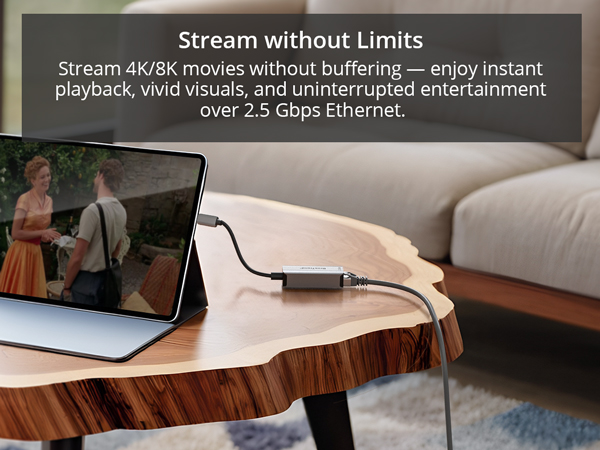 A Woman Is Streaming 4K 8K Video on iPad using the USB-C to Ethernet Adapter