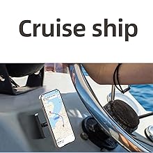 Smartphone mounted on a boat's steering wheel, displaying a navigation map. The phone is secured by a holder against a background of blue water and boat equipment.