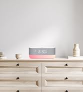 Alarm clock with multiple night light modes