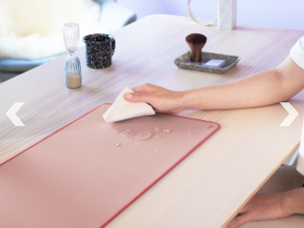 zoom of a woman cleaning studio series desk mat large dark rose mouse pad