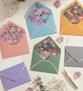 Premium artisan stationery with antique textures, vellum paper, and elegant gold foil finishes.