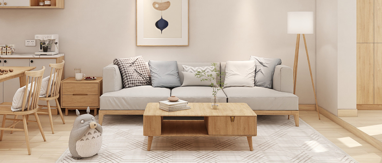 Minimalist living room with beige sofa, wooden coffee table, and dining area. Features neutral tones, natural light, and modern decor elements.