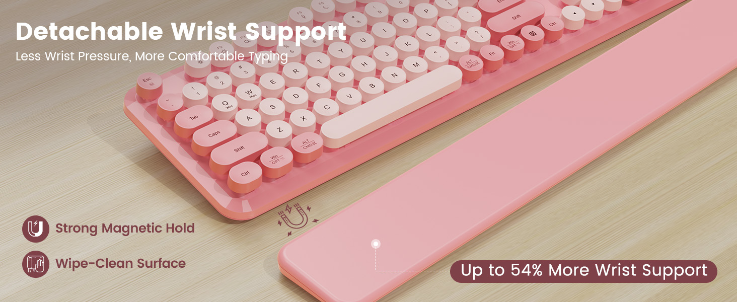 Keyboard on desk with detachable magnetic wrist rest, showing strong hold and wipe-clean surface.