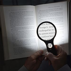 Led illuminated magnifier with energy-efficient bright light for reading in the dark