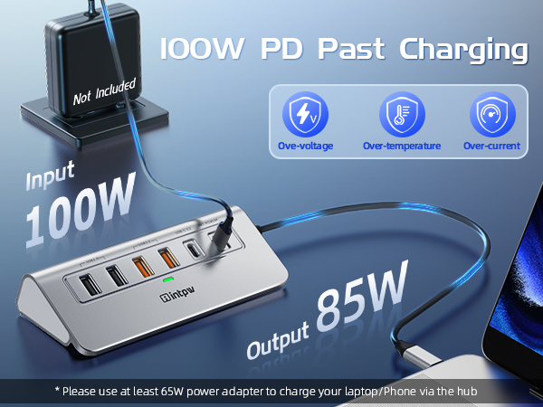 100W USB charging hub with multiple ports. Features 100W input, 85W output, and fast charging capabilities. Displays protection icons for over-voltage, temperature, and current. Blue cable connects to smartphone.
