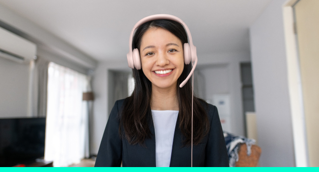 a woman wearing h390 usb headset rose