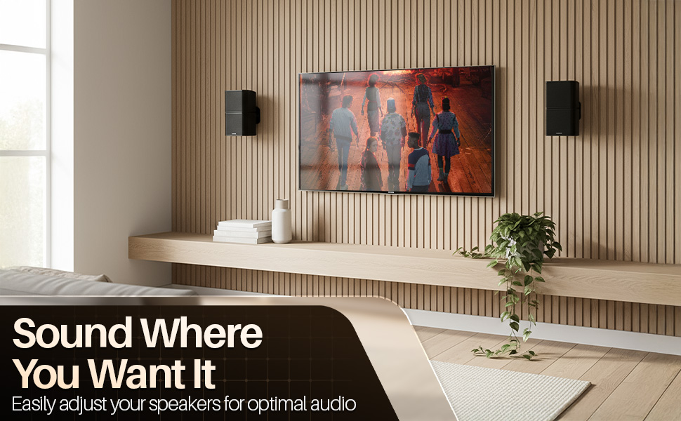 Adjustable wall brackets positioning rear channels using surround sound speaker mounts.