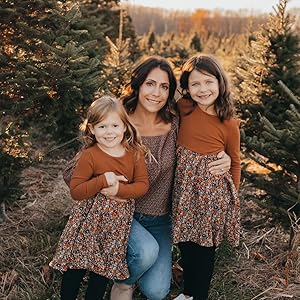 Owner with her two daughters