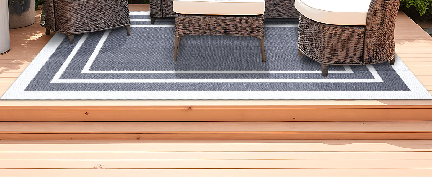 grey and white outdoor rug