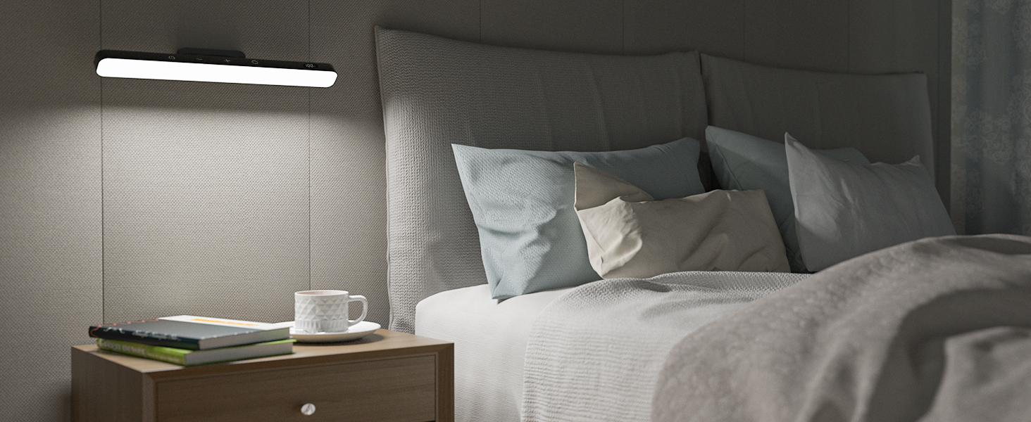 Modern bedroom with a sleek, wall-mounted light fixture above a wooden nightstand. Bed with gray pillows and duvet visible.