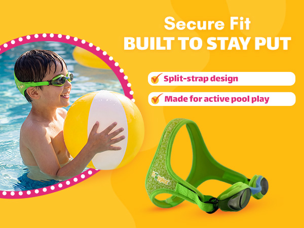 Boy holding a beach ball wearing green secure fit kids swim goggles
