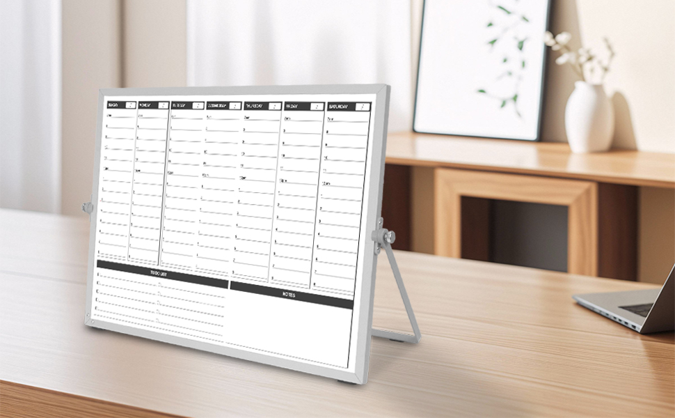whiteboard calendar stand on the work table