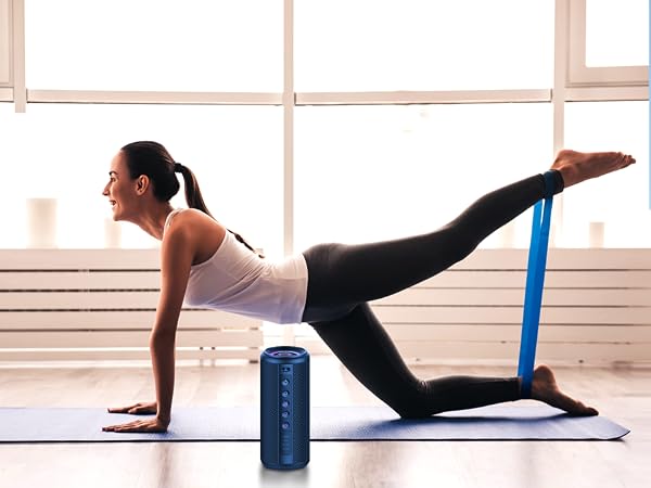 Exercise scene with blue foam roller on yoga mat near window, demonstrating leg lift exercise position.