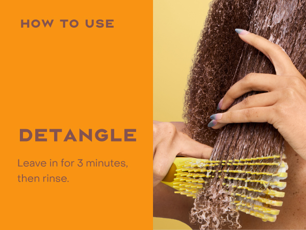 Image of a comb detangling hair.