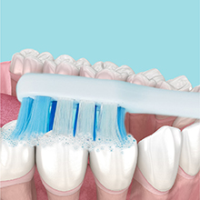 Close up of teeth being brushed