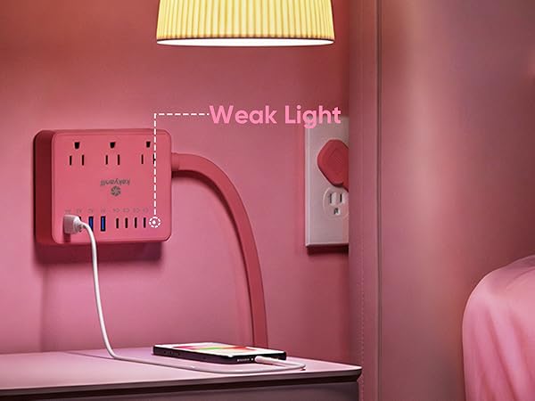 The indicator light of this pink power strip is dim and will not affect sleep.