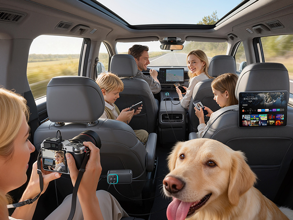 Interior view of family vehicle showing multiple passengers and a golden retriever dog. Car interior features multiple headrests and backseat entertainment system.