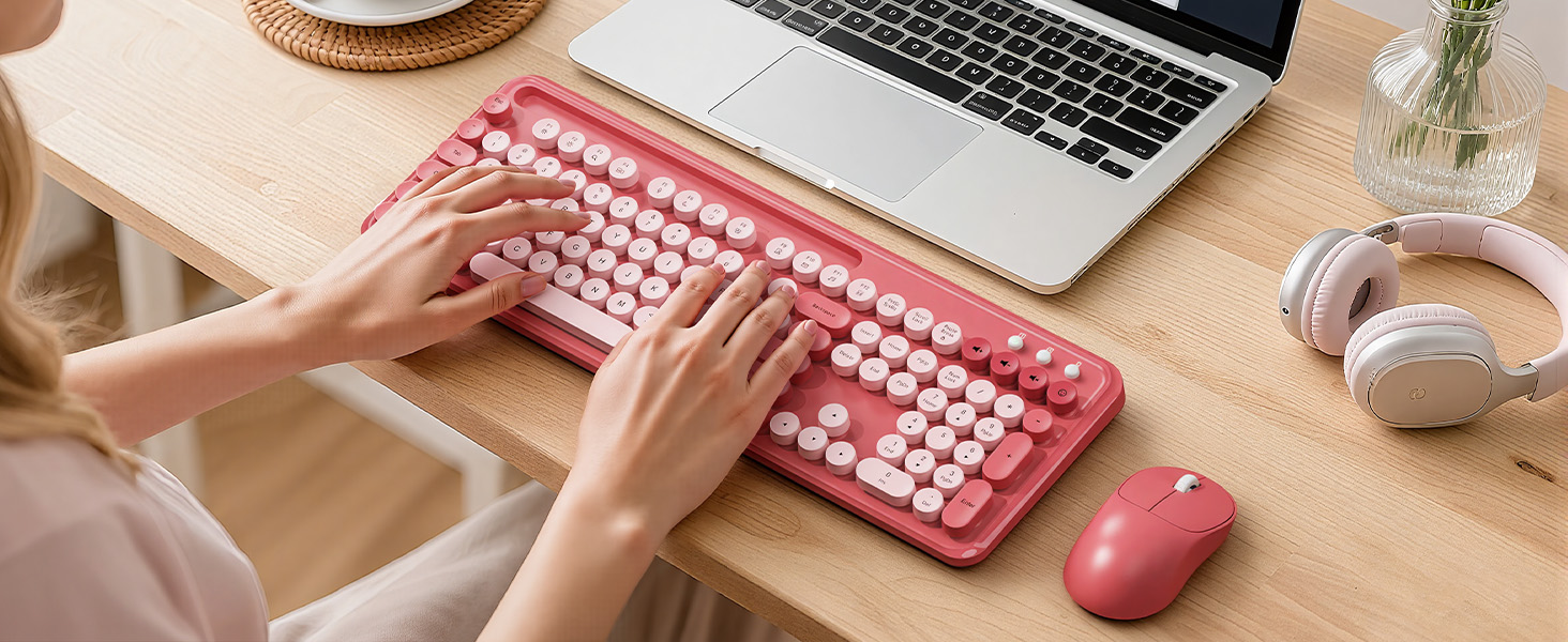 Christmas gift idea for women who love cute pink workspaces and soft typing feel.