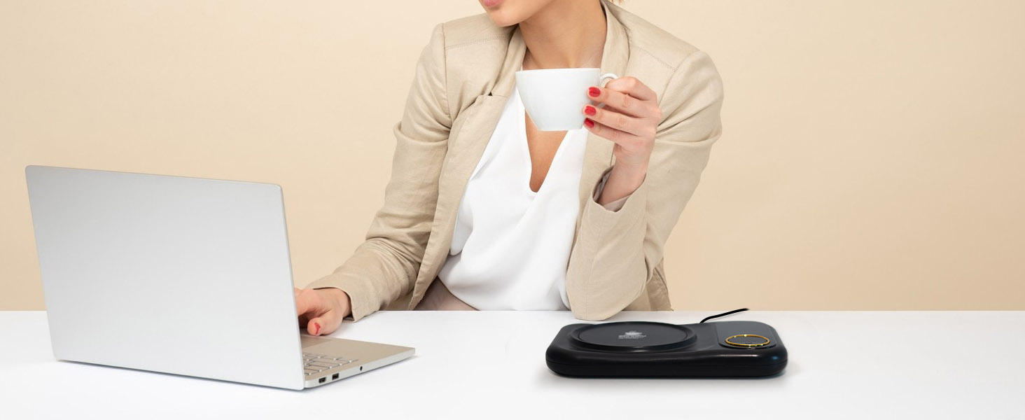 Close-up shots of hands using laptop computer, showing typical work or study setup on beige surface.