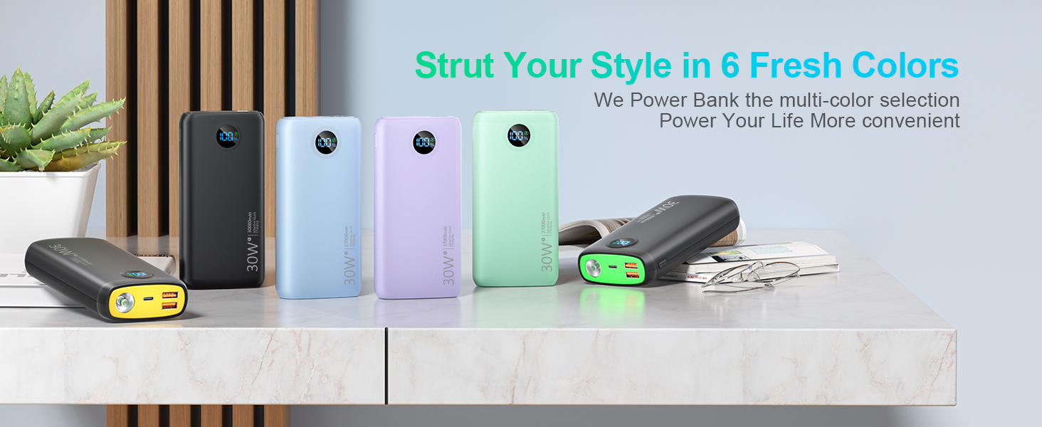 Travel-ready portable charger with 30W output for phones and tablets.