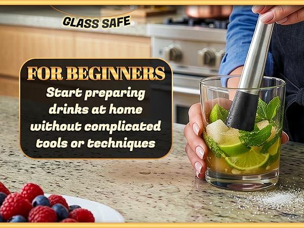 mojito muddler used in glass with lime and ice showing easy use for home cocktail mixing