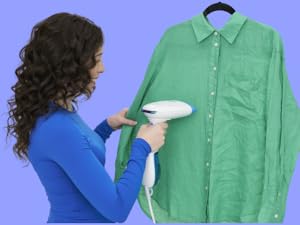 Woman steaming shirt