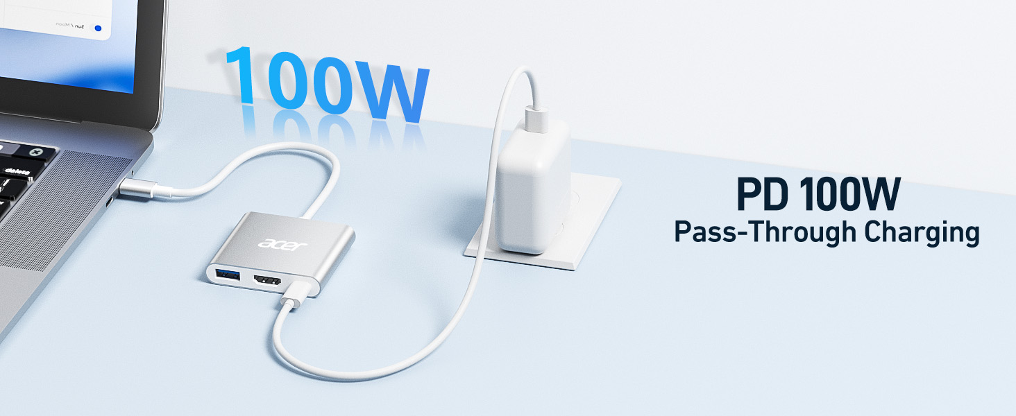 Text reads '100W' and 'PD 100W Pass-Through Charging'. Shows white charging cable and adapter on light blue surface with USB ports.