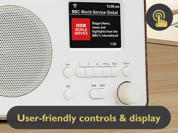 Text reads 'BBC World Service Group' and 'User-friendly controls &amp; display'. White digital radio device with circular speaker and control buttons shown from multiple angles.