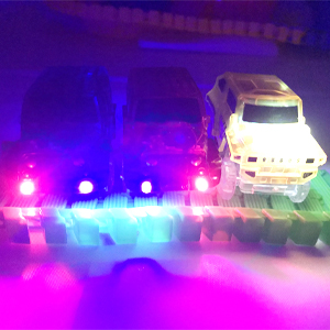 Toy Car Each race car has 3 LED lights that glow as they speed around the track