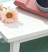 White table or surface with pink daisy flower decoration, showing multiple angles and close-up details of the furniture piece.