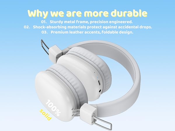 White over-ear headphones with adjustable headband. Features include sturdy metal frame, shock-absorbing materials, and premium leather accents for durability and comfort.